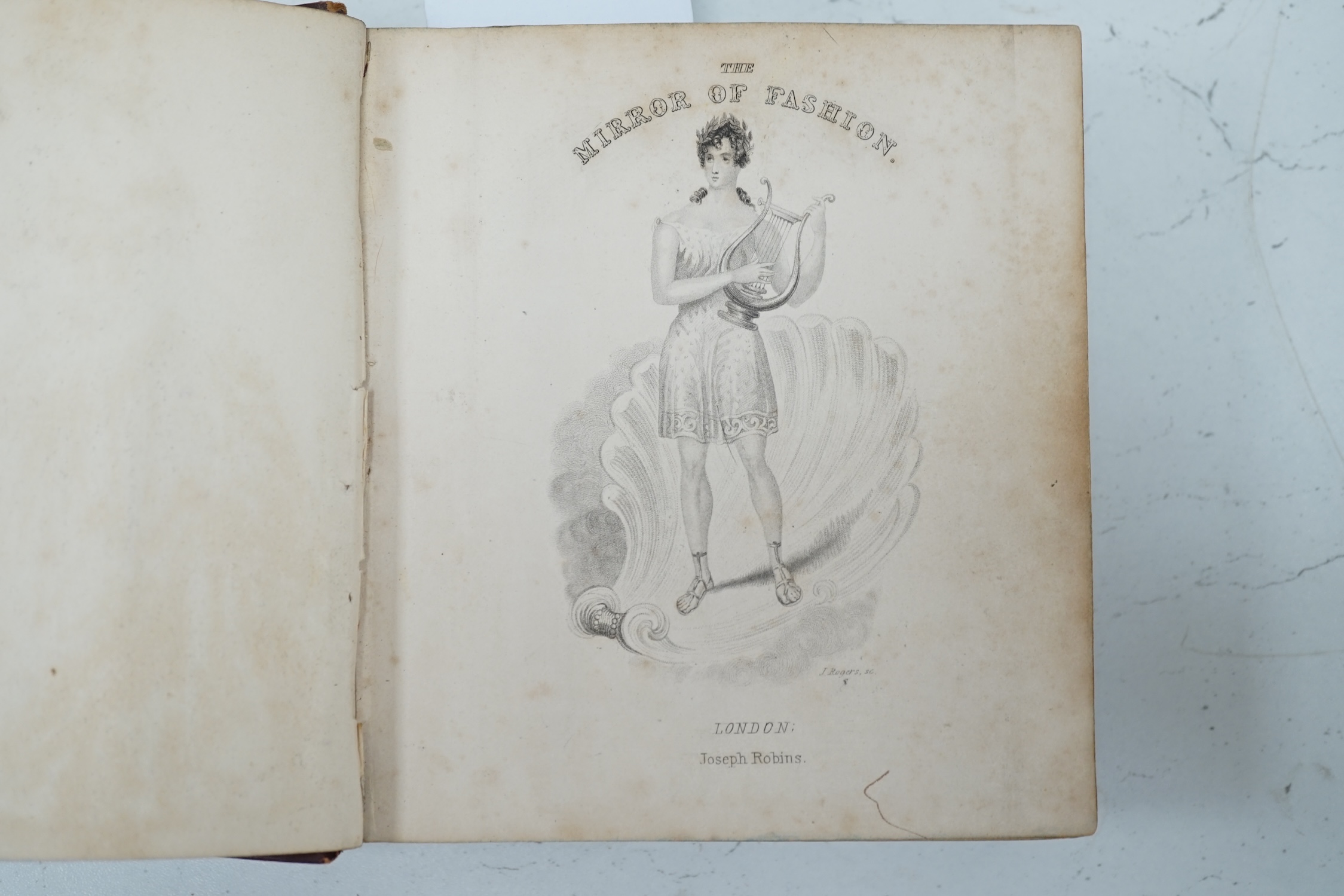 The Mirror of Fashion by Joseph Robins, London, 19th century hardback book with illustrated fashion plates. Condition - fair